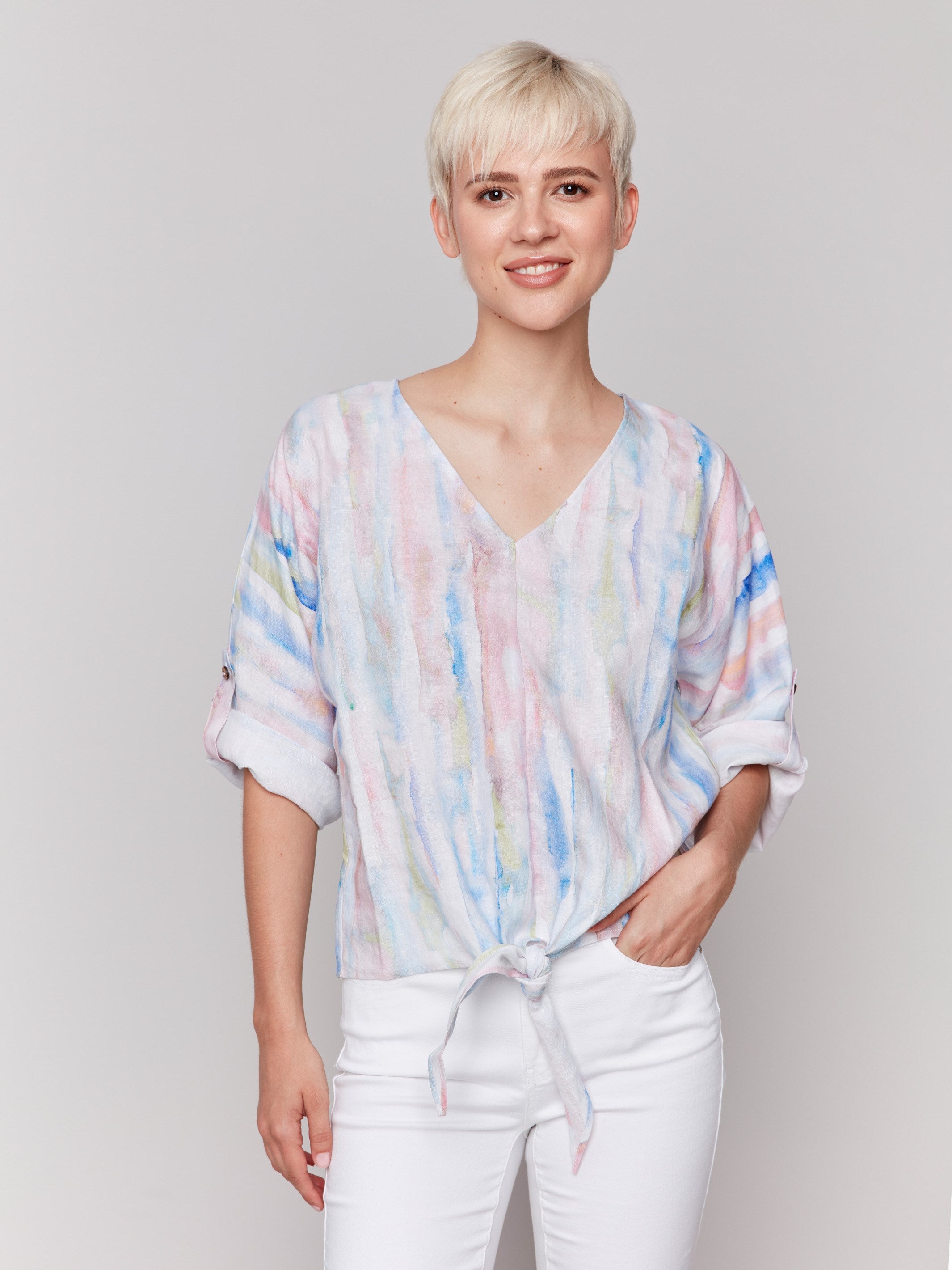 Abstract pattern top with a V-neck and front tie by Charlie B.