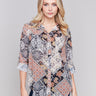 Paisley printed blouse with button-front, featuring patch pockets and roll-up sleeves by Charlie B