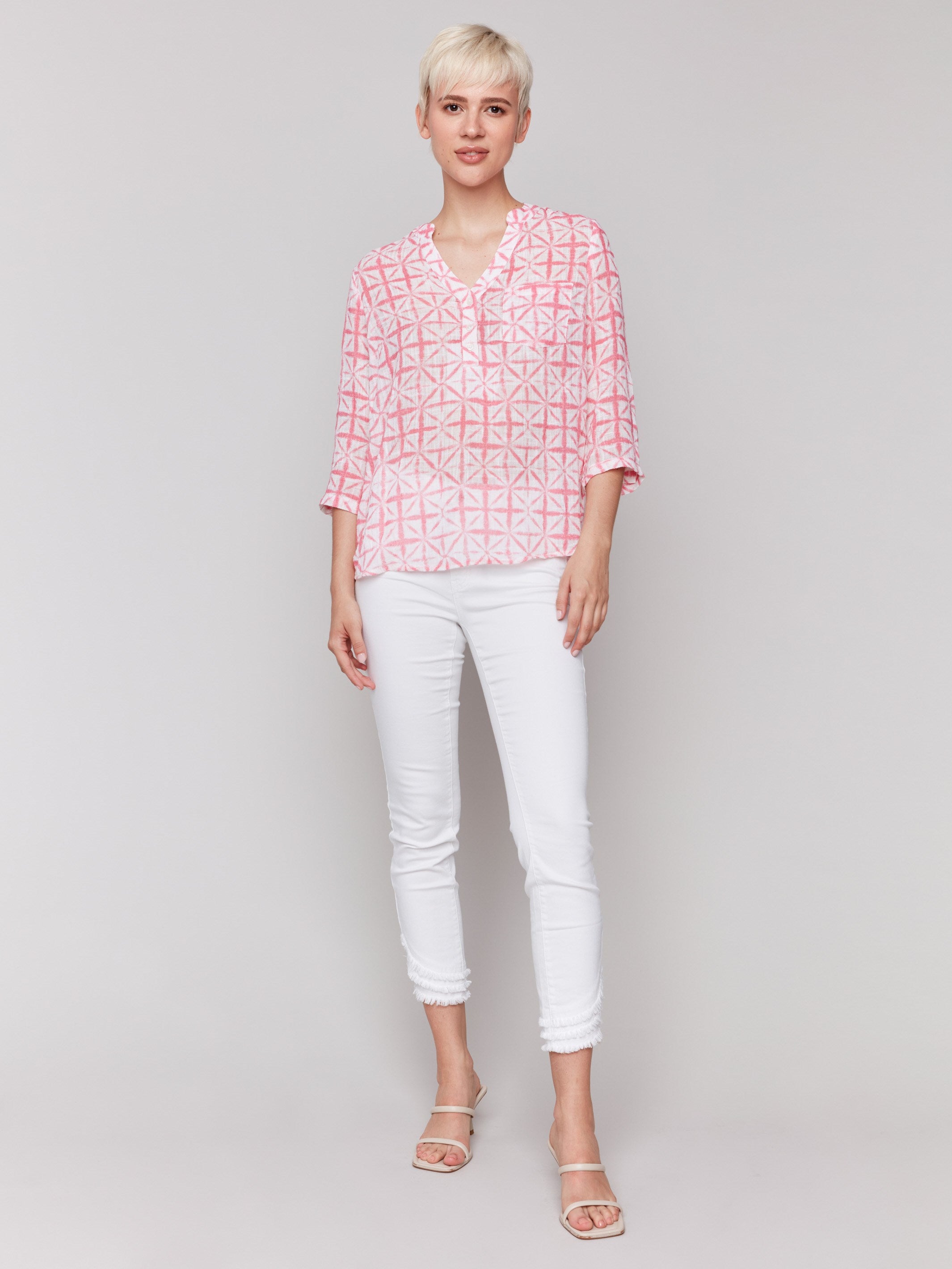 Stylish begonia pink blouse with a mao collar and unique design by Charlie B.