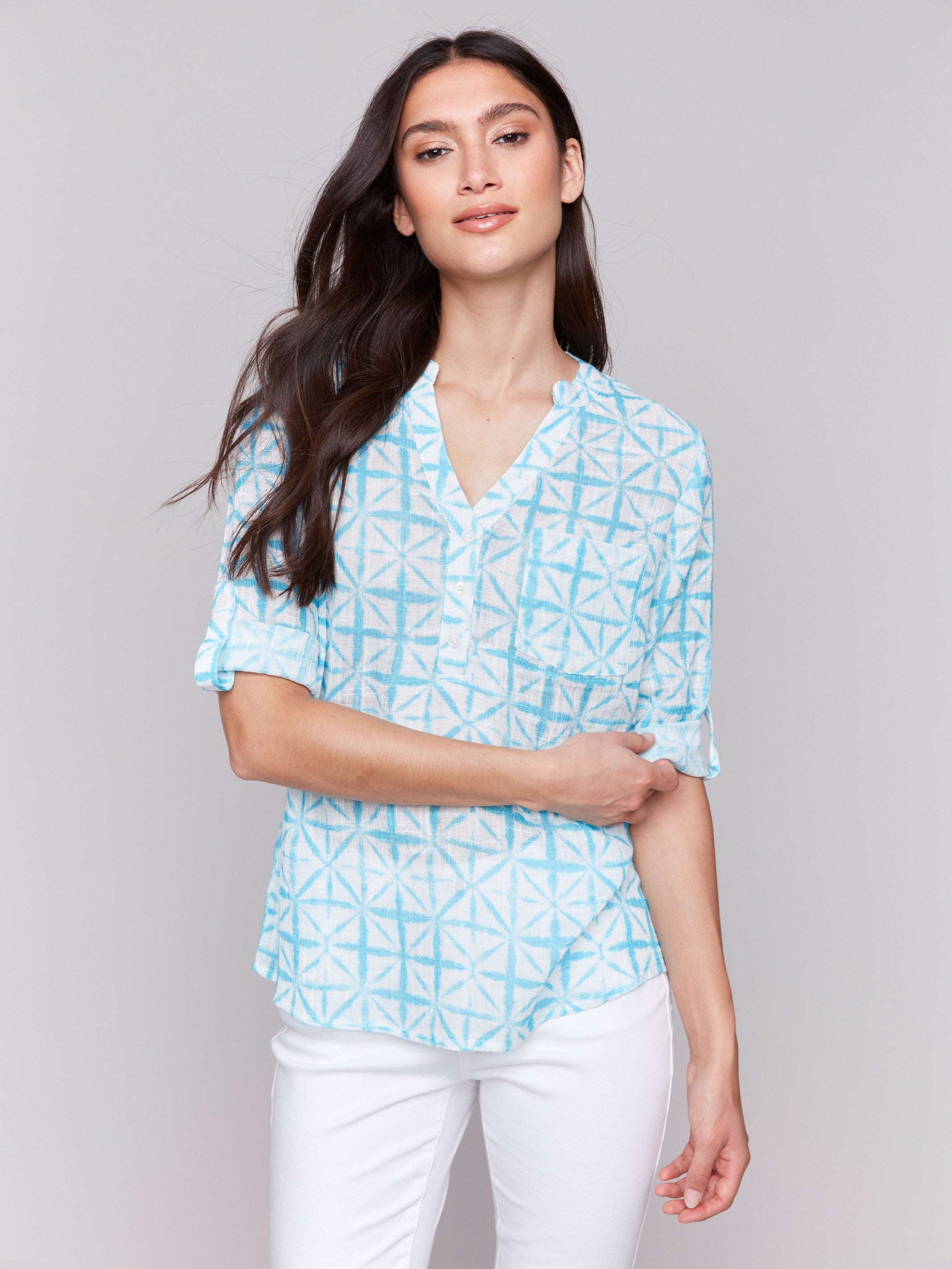 Lagoon print blouse featuring a unique mao collar by Charlie B.