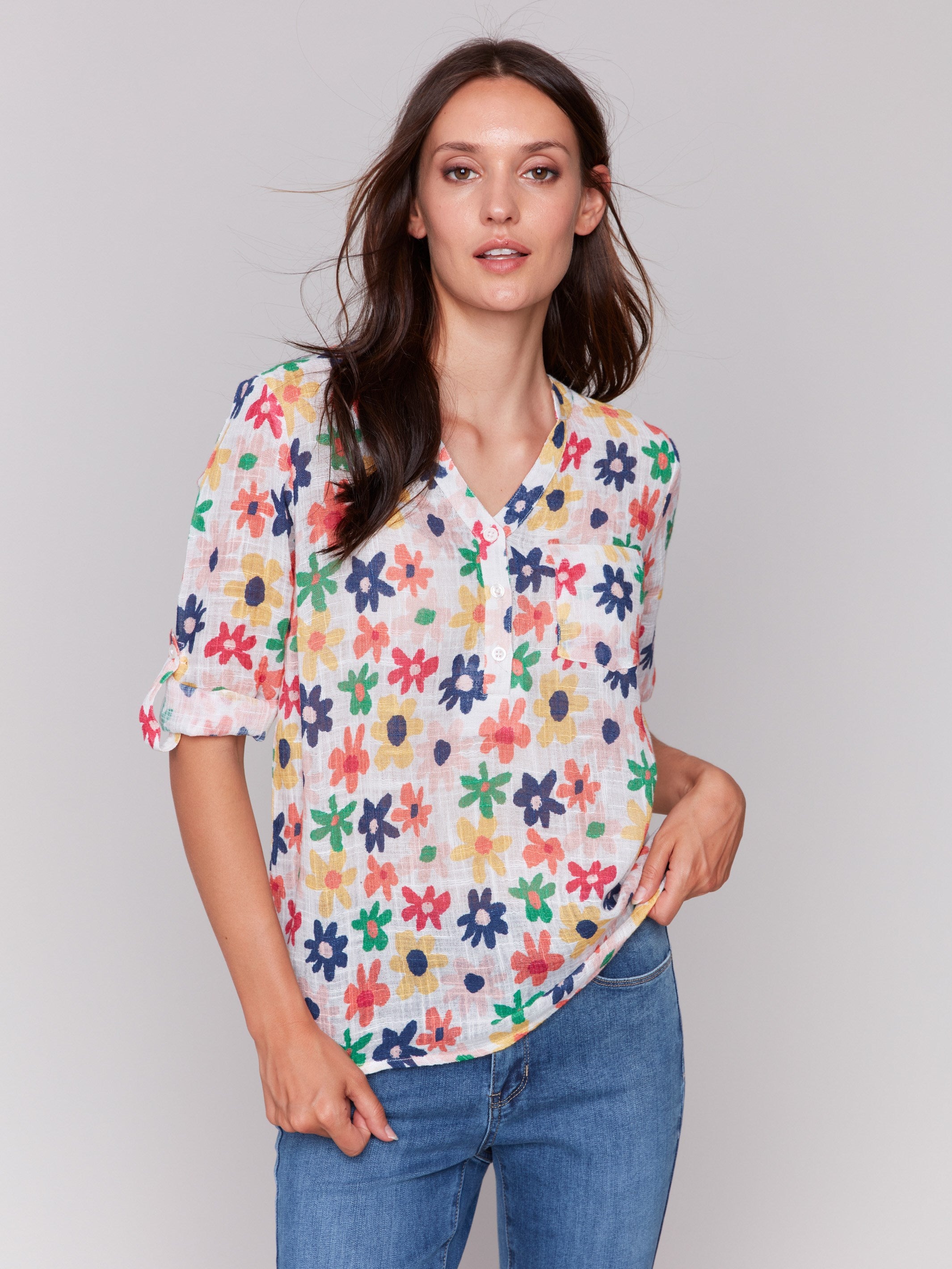 Stylish half-button front blouse with daisy design by Charlie B.