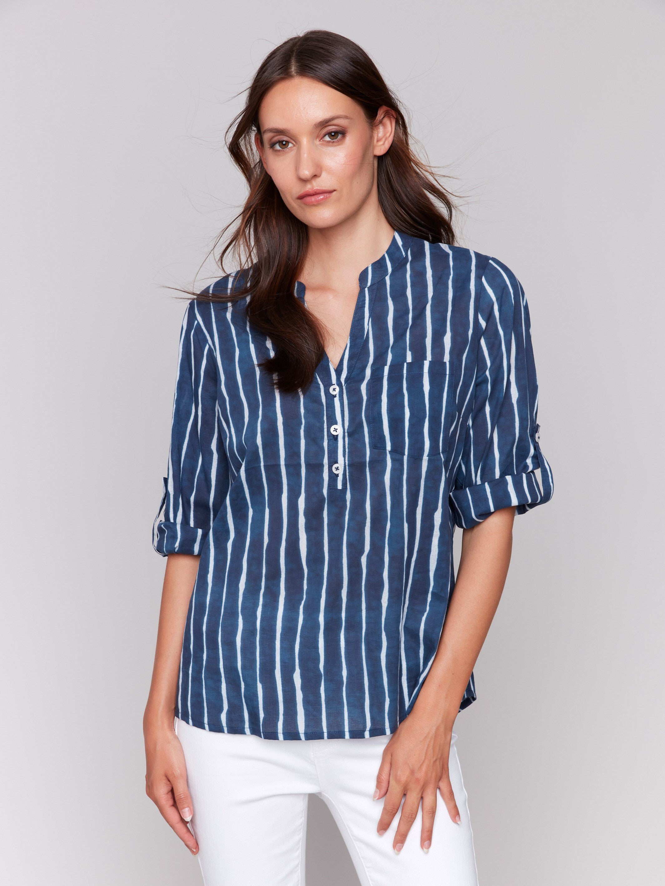 Chic striped pattern on an indigo blouse by Charlie B.