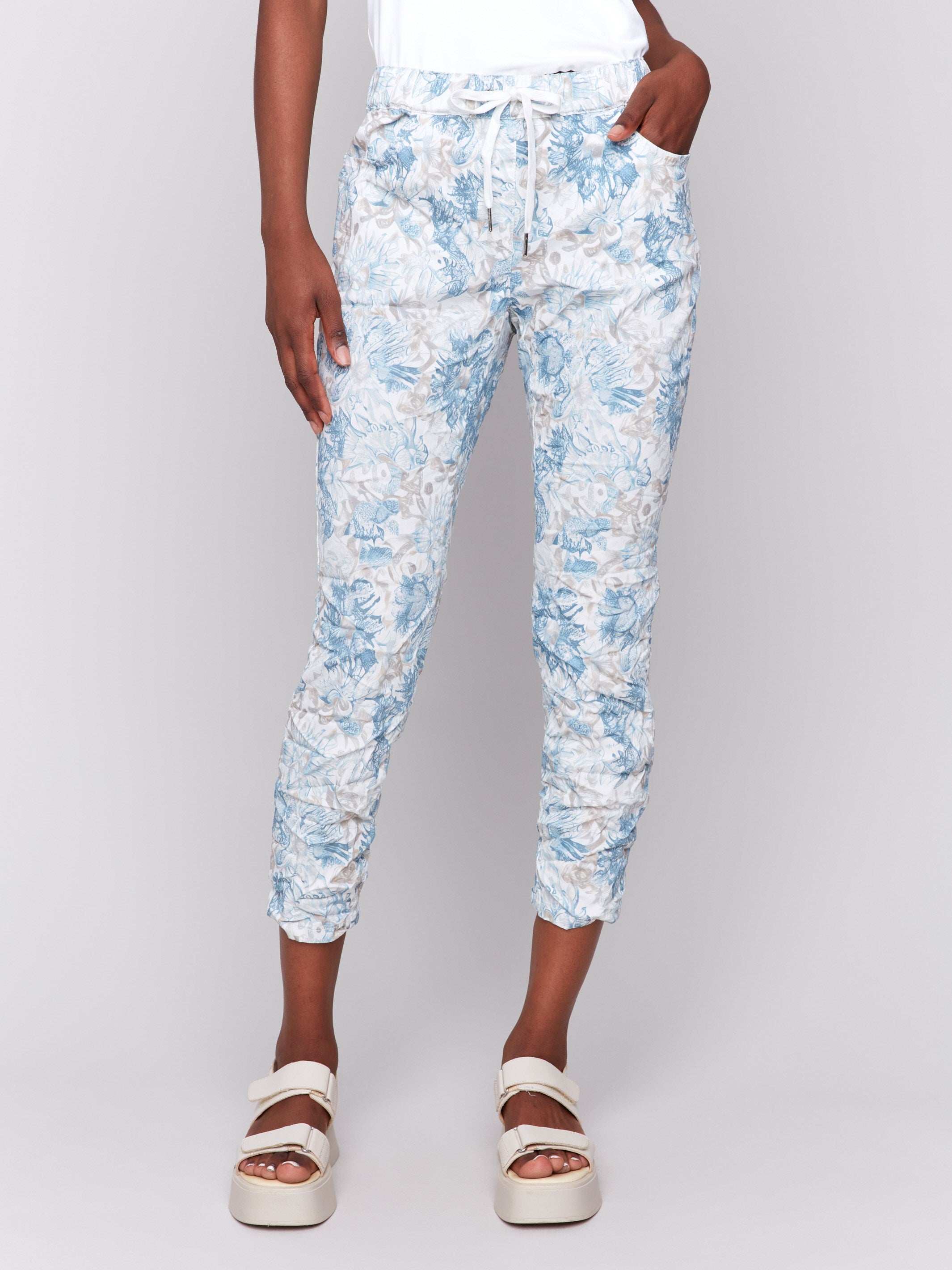 Jogger pants featuring a cropped length in stretch fabric by Charlie B.