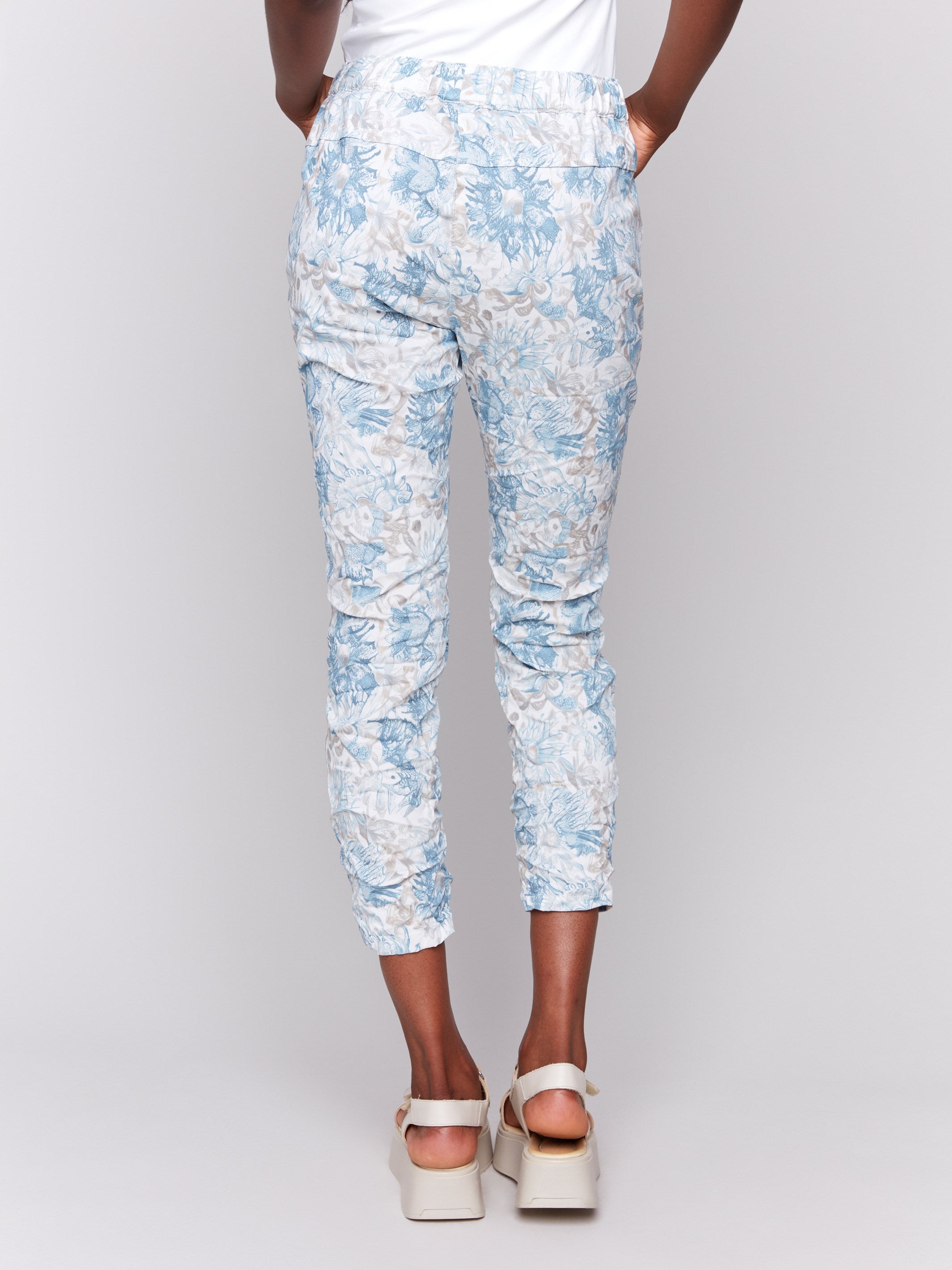 Floral design joggers with two side pockets for convenience by Charlie B.