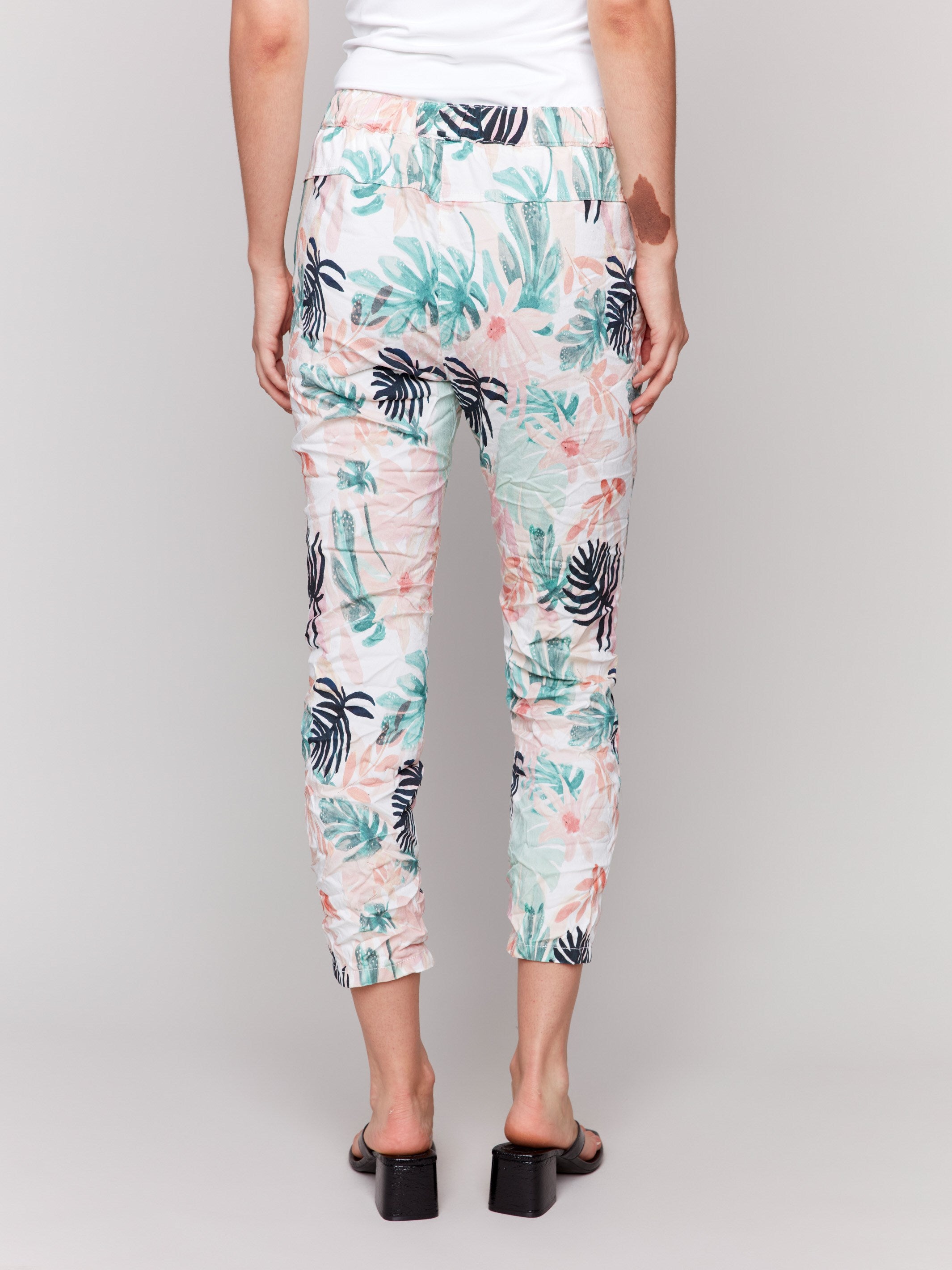 Floral-printed crinkle joggers in a relaxed fit with two side pockets by Charlie B.