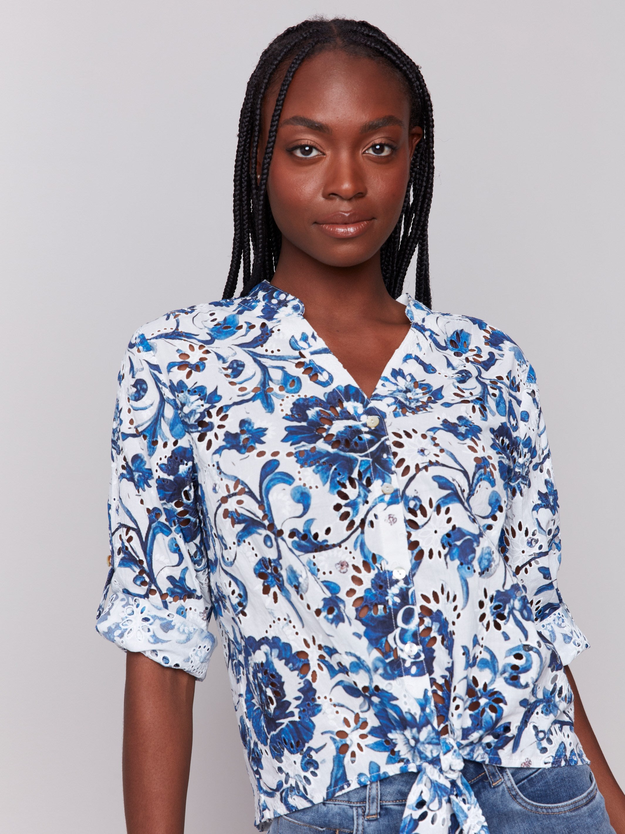 Cotton blouse featuring eyelet fabric and button-down front by Charlie B.