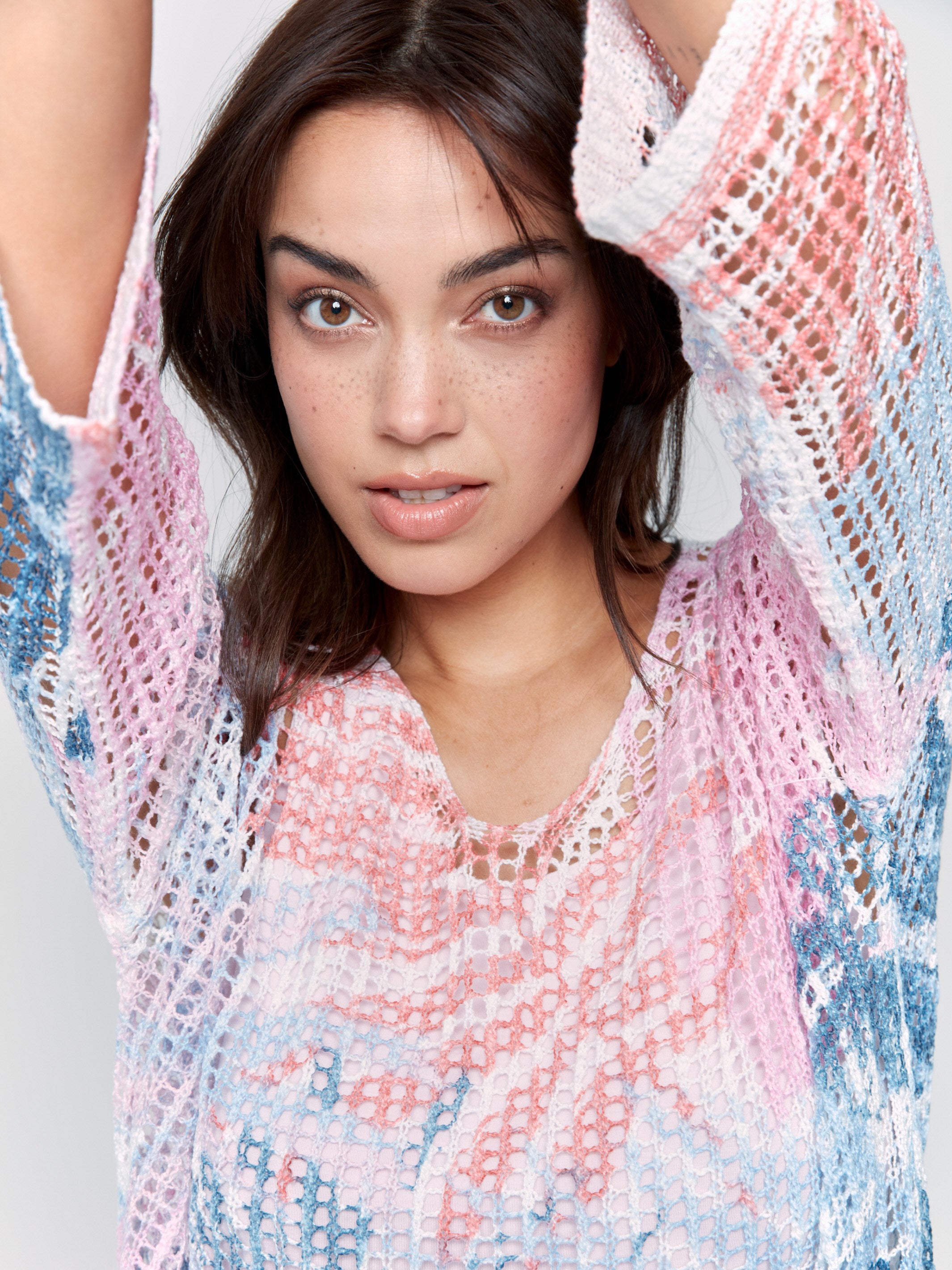 A lightweight V-neck crochet sweater with a tropical print and loose fit by Charlie B.