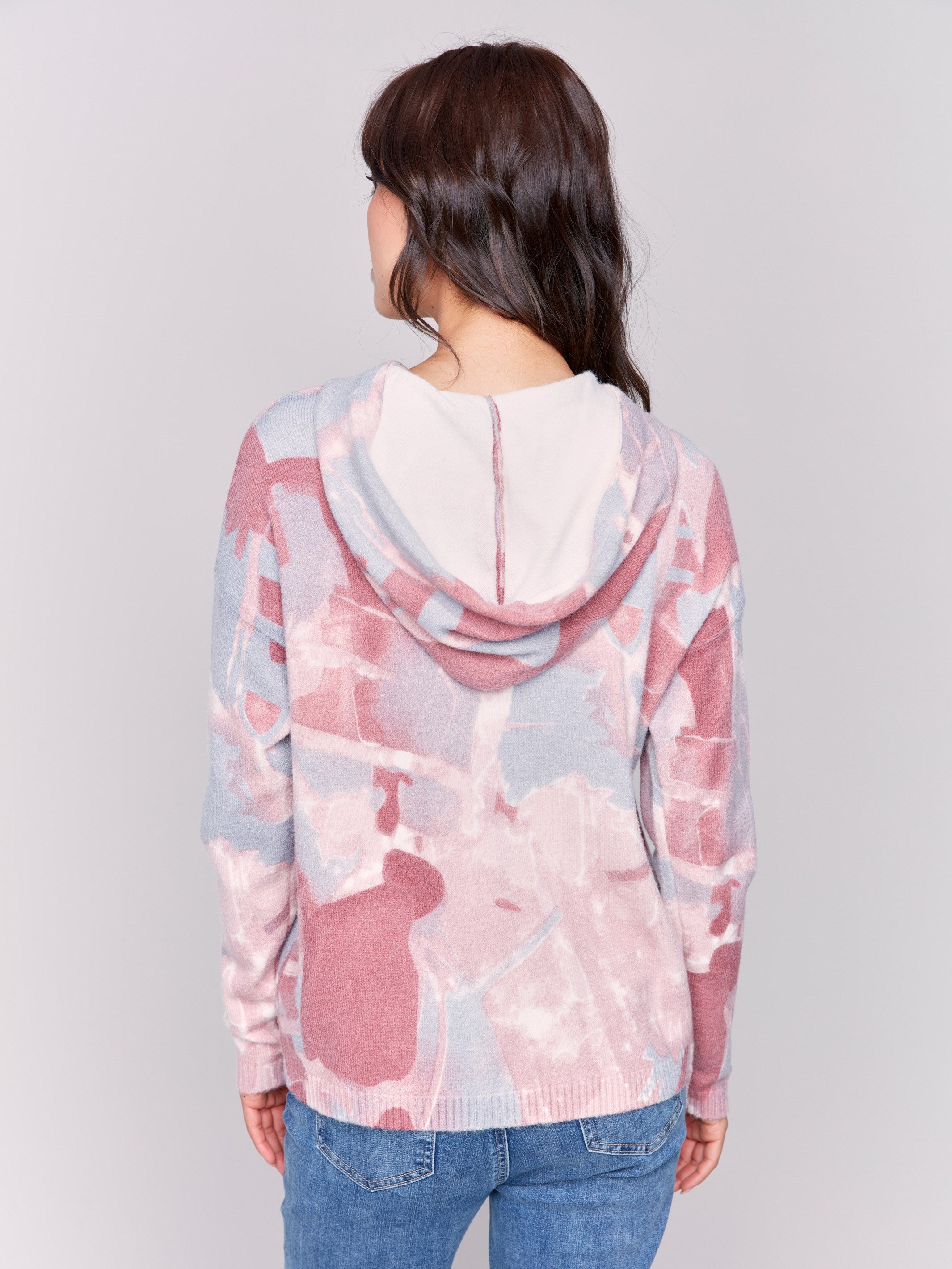 Printed hoodie sweater in pink and blue with raglan sleeves, a hood with drawstrings, and ribbed cuffs and hem by Charlie B.