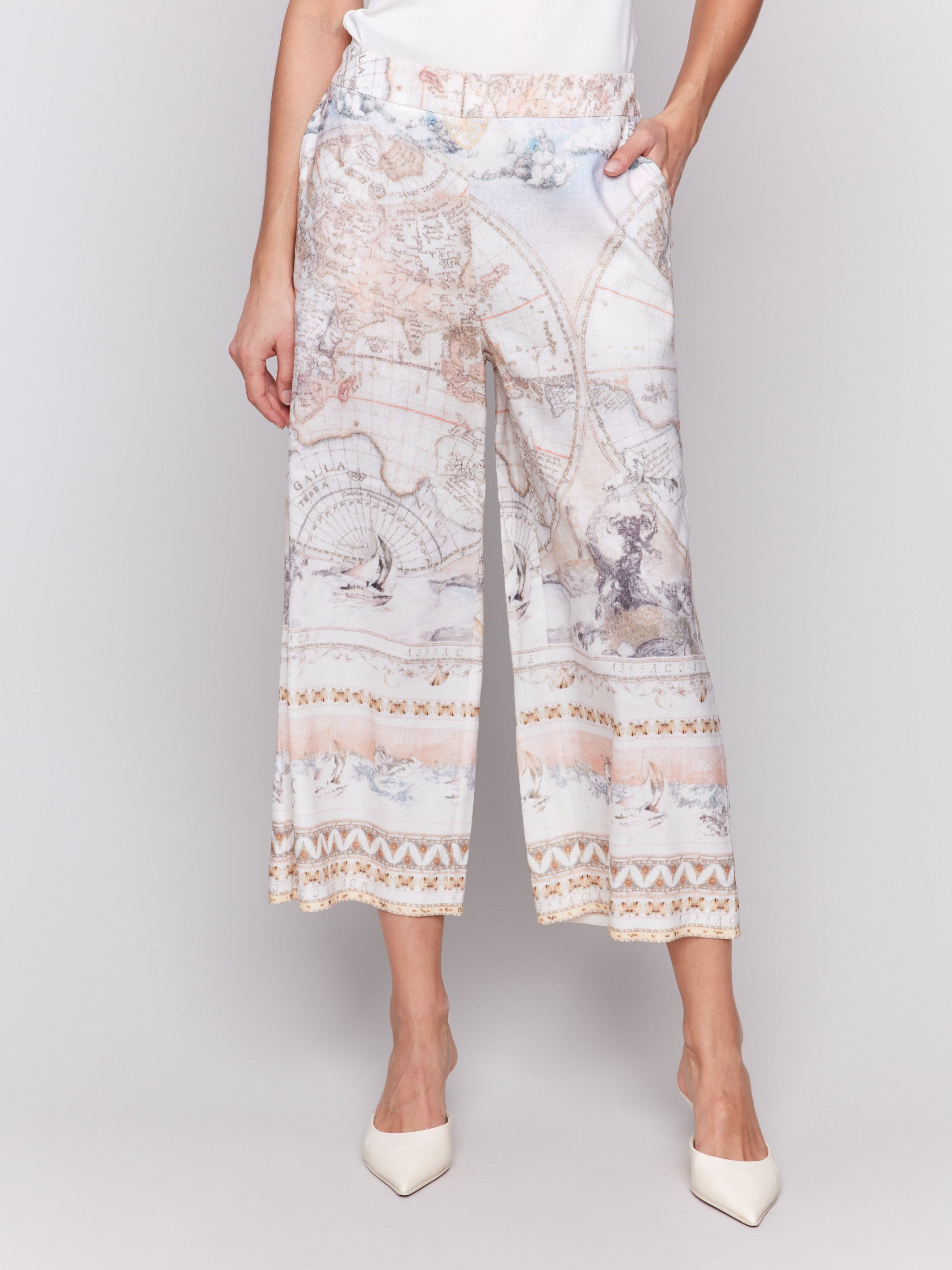 Cropped length printed pants with elastic waistband and side pockets by Charlie B.