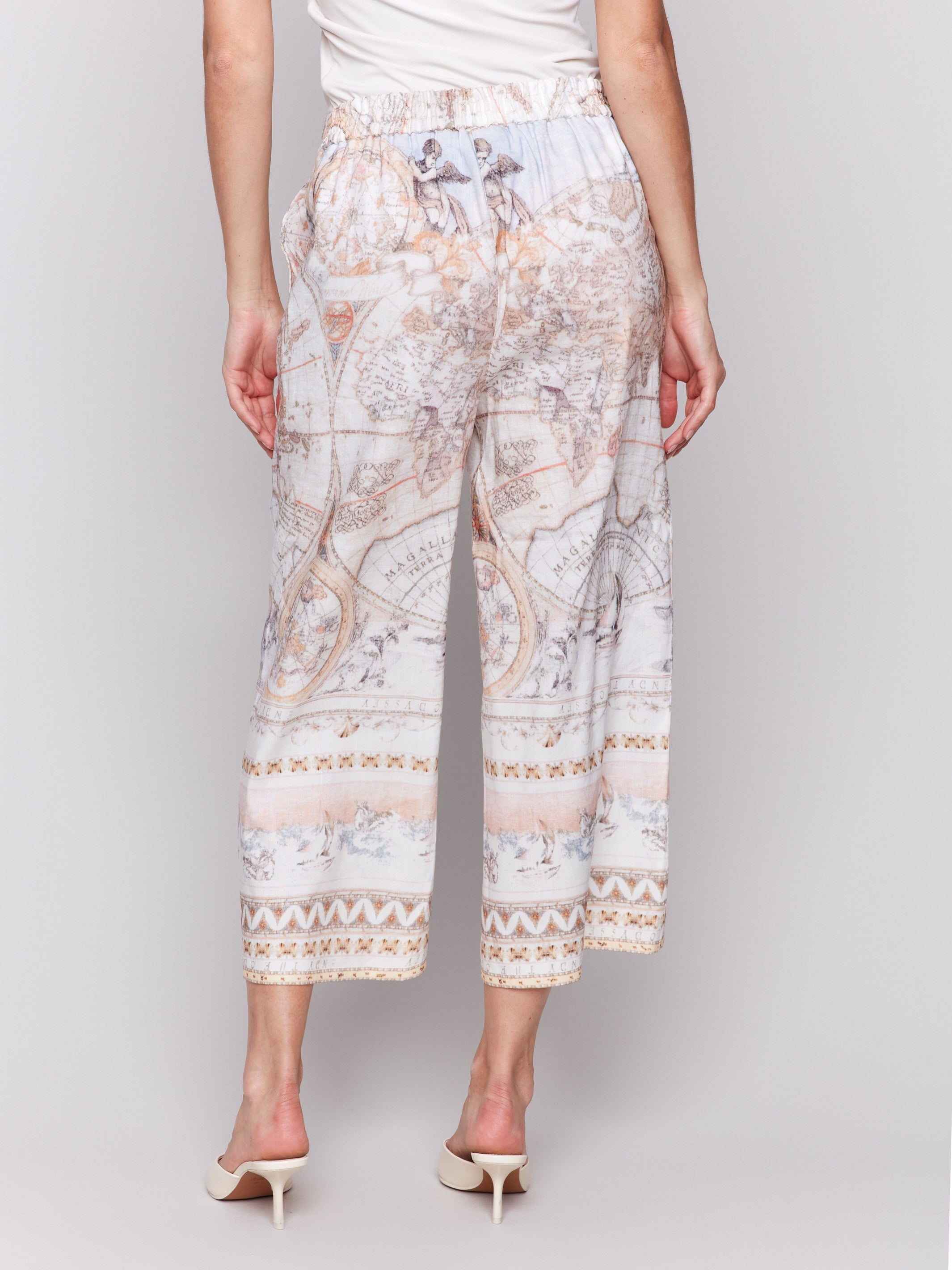 Functional side pockets on printed linen-blend cropped pants by Charlie B.