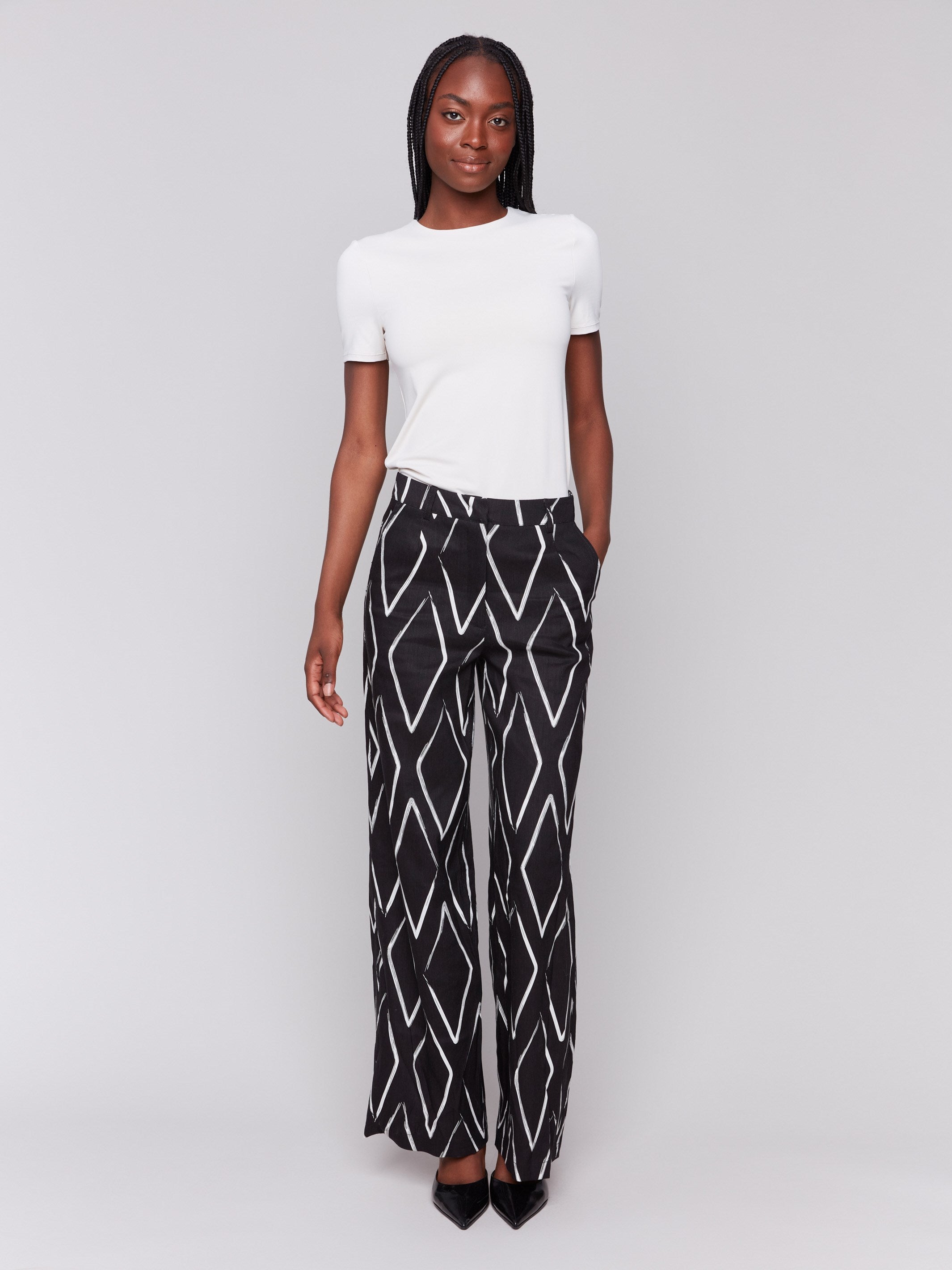 Geometric pattern print pants with a stylish design by Charlie B.