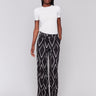 Geometric pattern print pants with a stylish design by Charlie B.