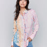 Abstract pattern blouse with a button-front closure by Charlie B.