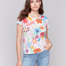 White t-shirt with floral pattern, crafted from organic cotton by Charlie B.