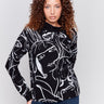 Black and white abstract face print funnel neck cotton sweater for women by Charlie B.