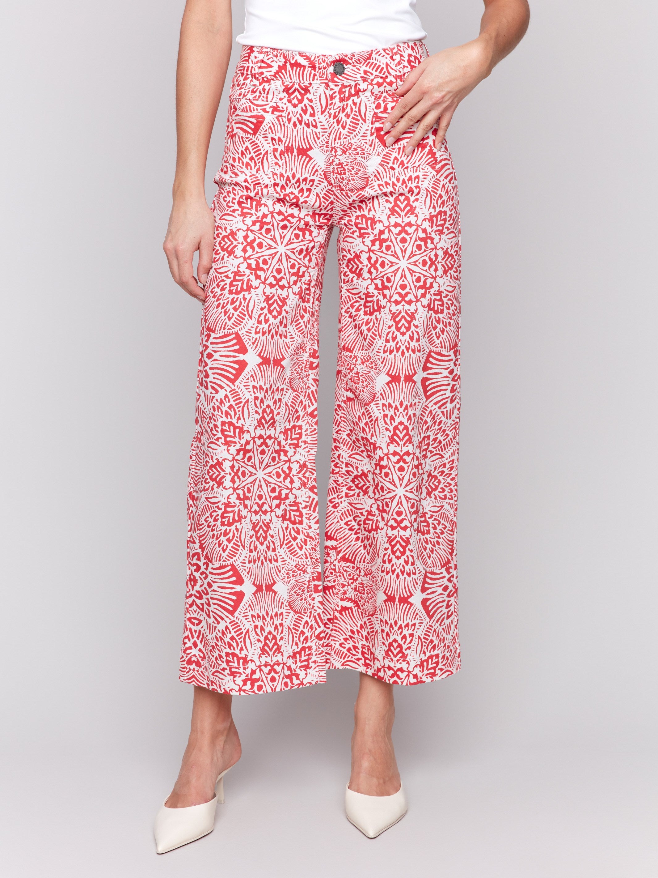 Printed patch pocket flare pants in a red and white abstract design for women, Charlie B.