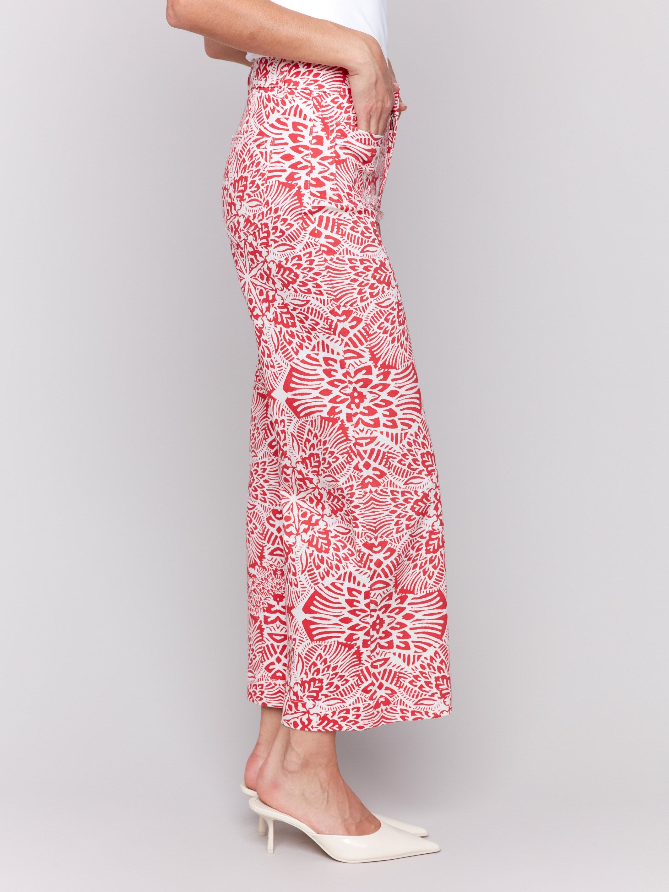 Printed patch pocket flare pants in a red and white abstract design for women, Charlie B.