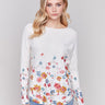 White sweater with colorful floral prints, long sleeves and crew neckline by Charlie B.