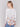 White sweater with colorful floral prints, long sleeves and crew neckline by Charlie B.