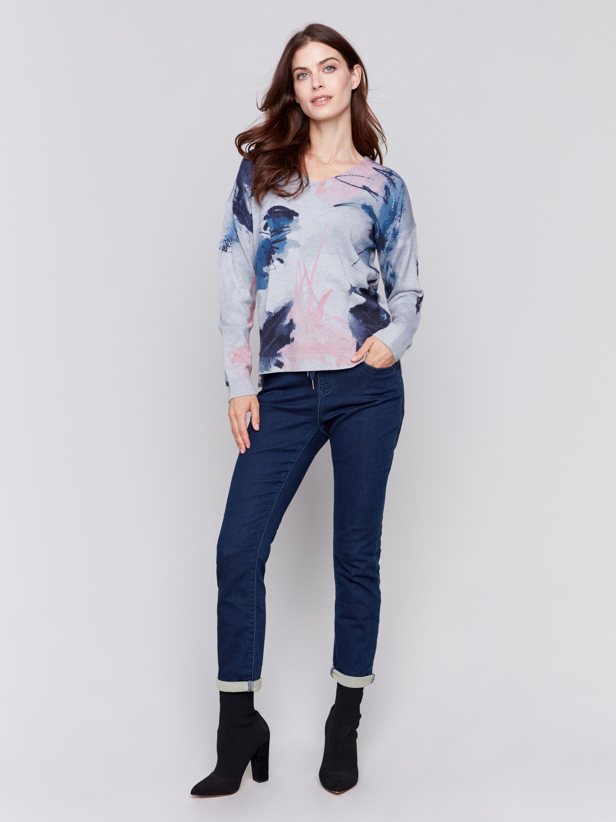 Light grey V-neck sweater with an abstract print and drop shoulders by Charlie B.