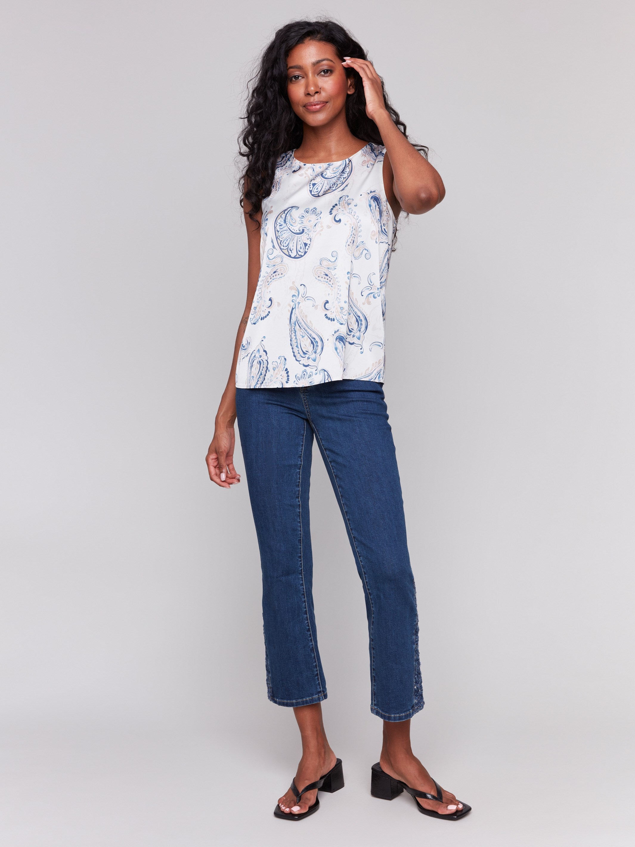 Ivory sleeveless top with a paisley print and keyhole detail at the back, by Charlie B.