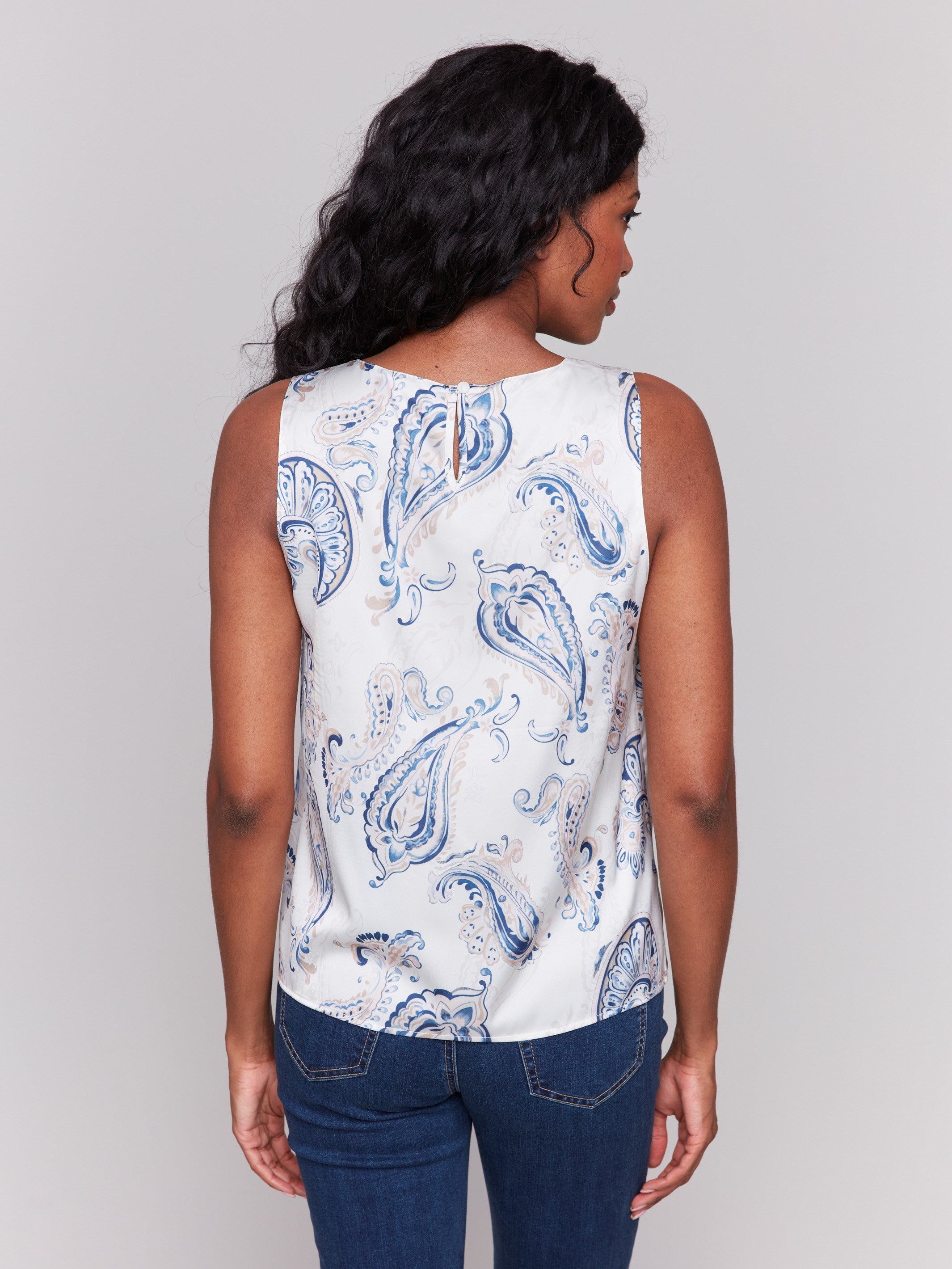 Ivory sleeveless top with a paisley print and keyhole detail at the back, by Charlie B.