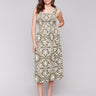 Celadon-green dress featuring a mid-calf length and graphic pattern by Charlie B.