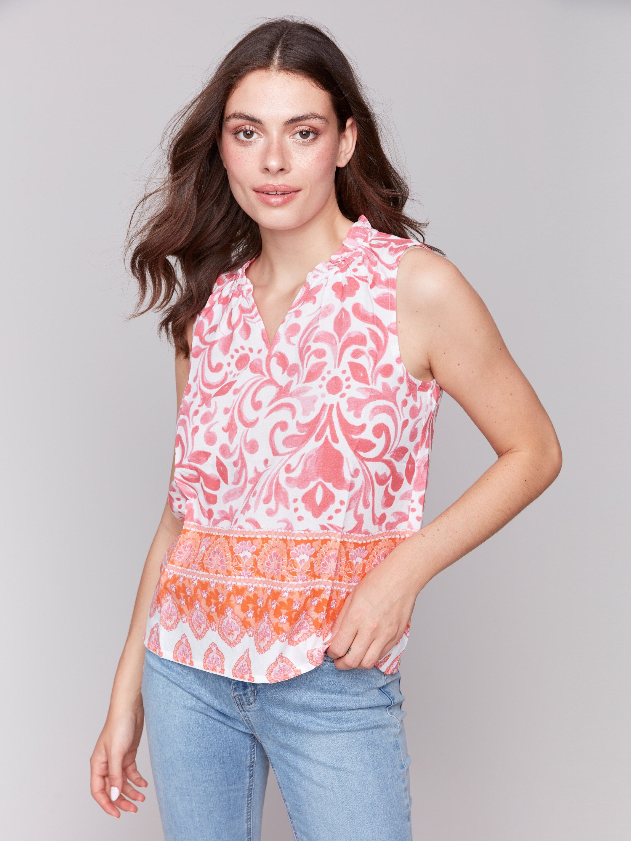 Clementine and pink blouse with intricate abstract pattern by Charlie B.