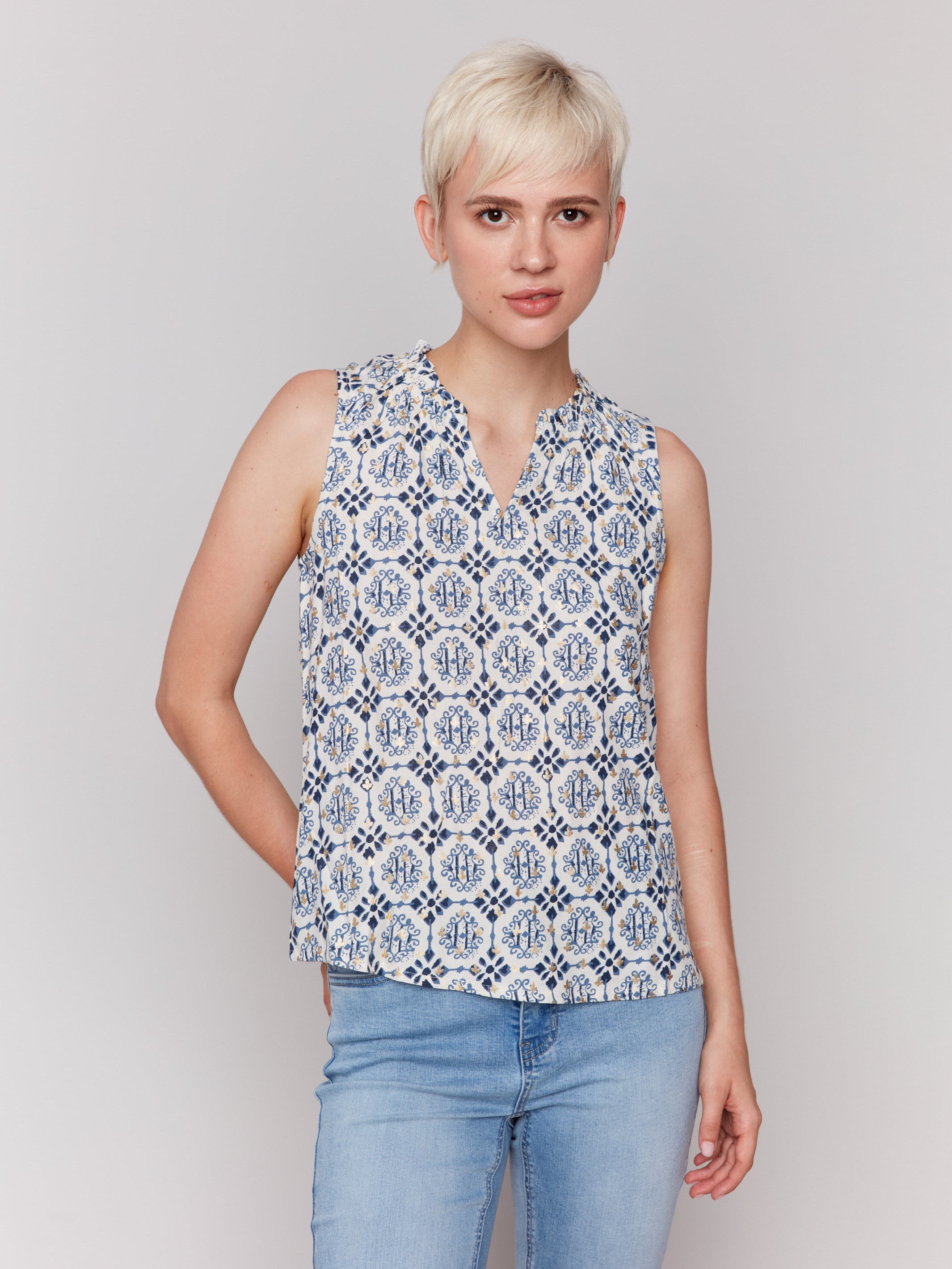 Geometric pattern blouse with a V-neck opening by Charlie B.