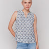 Geometric pattern blouse with a V-neck opening by Charlie B.