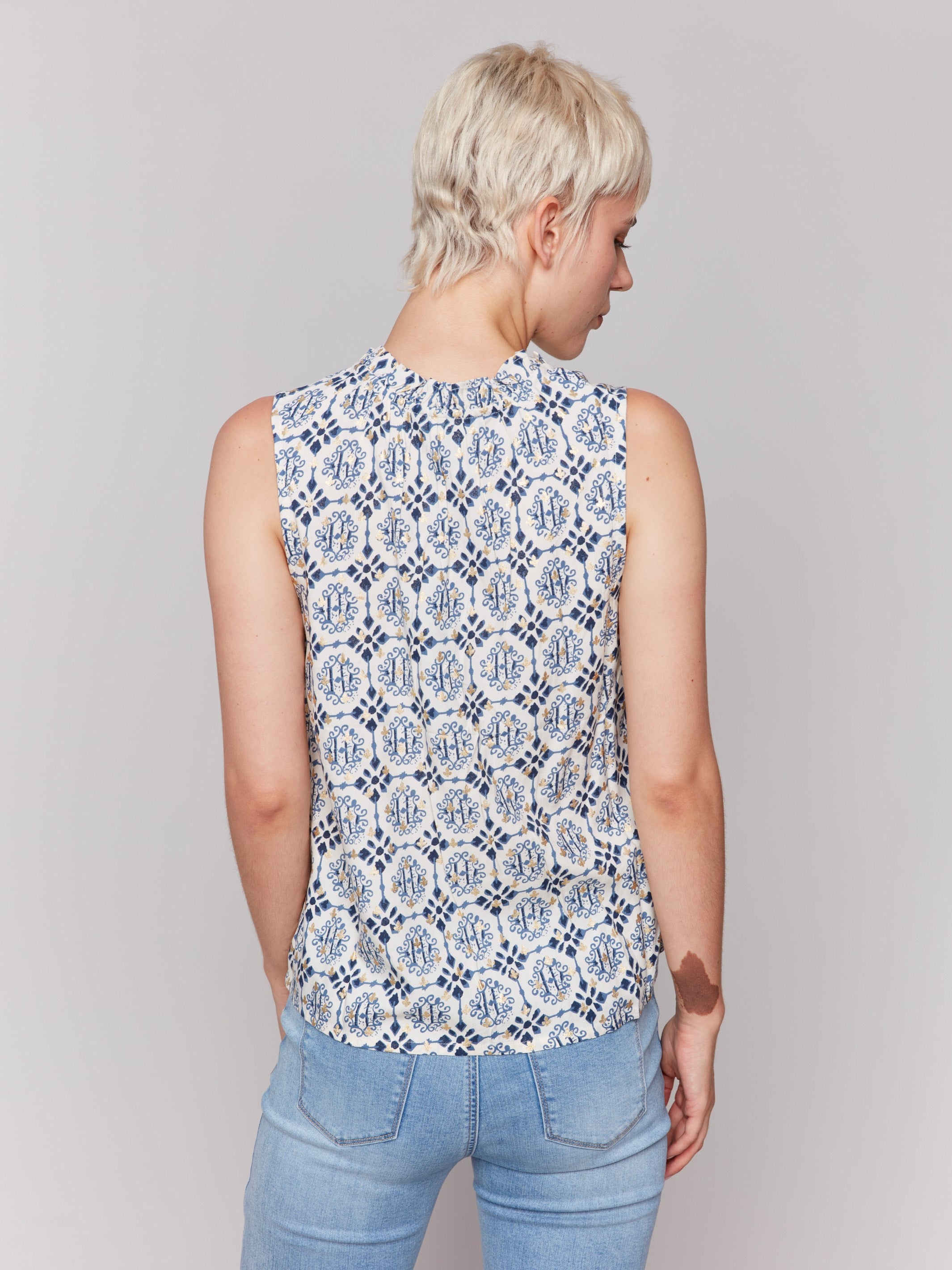 Sleeveless top showcasing intricate patterns by Charlie B.