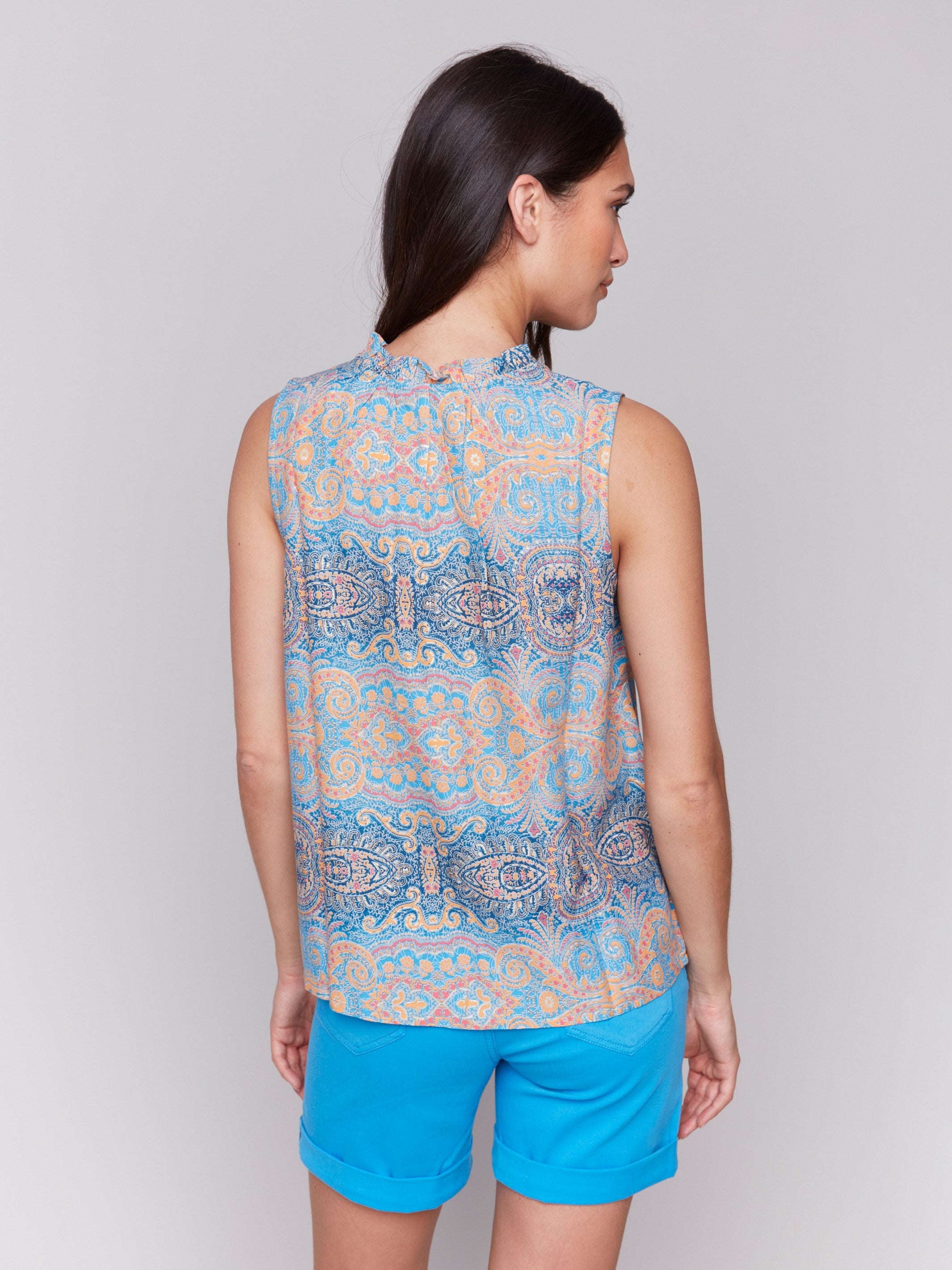 V-neck opening on a stylish printed top by Charlie B.