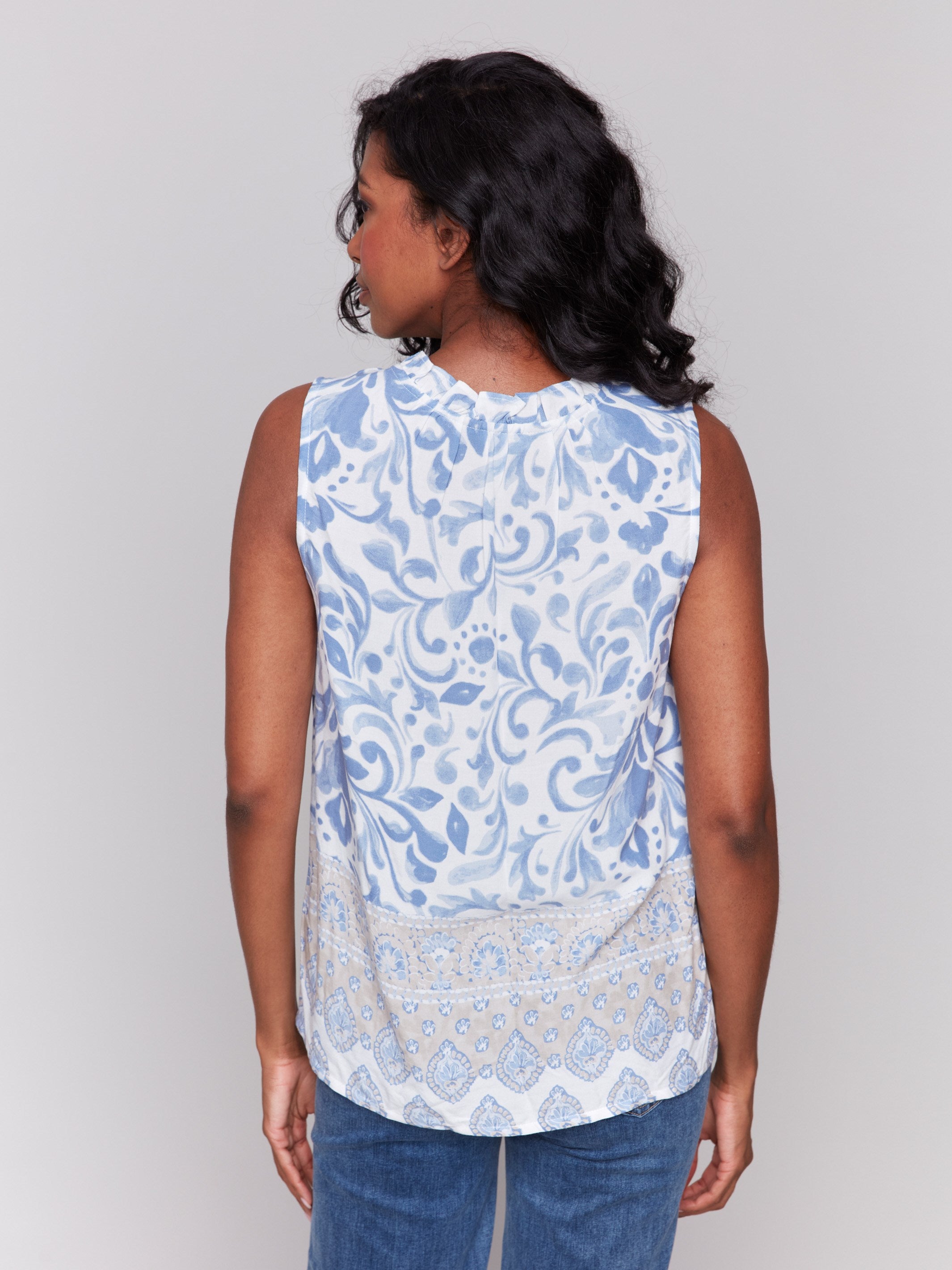 Blouse featuring intricate abstract design by Charlie B.