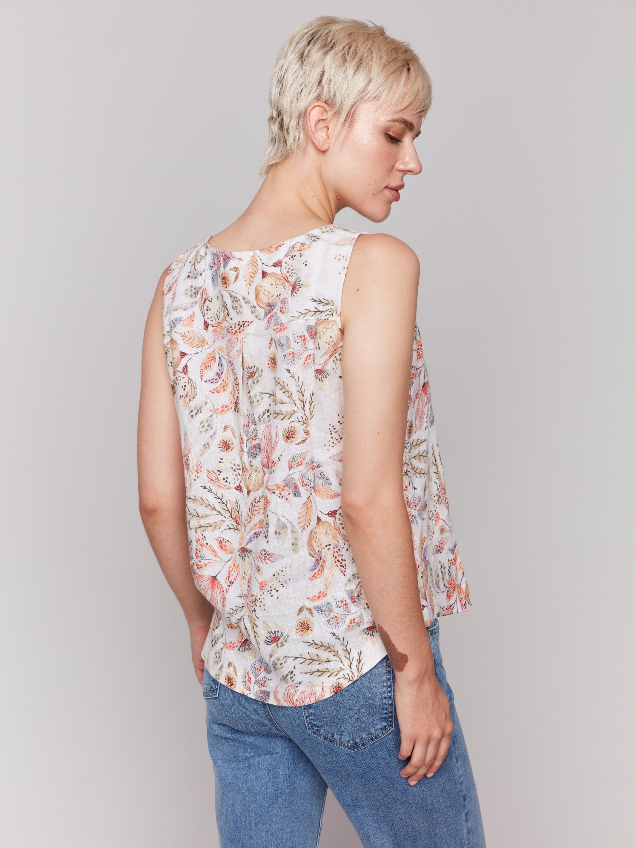 Rounded hem top in tropical print style by Charlie B.