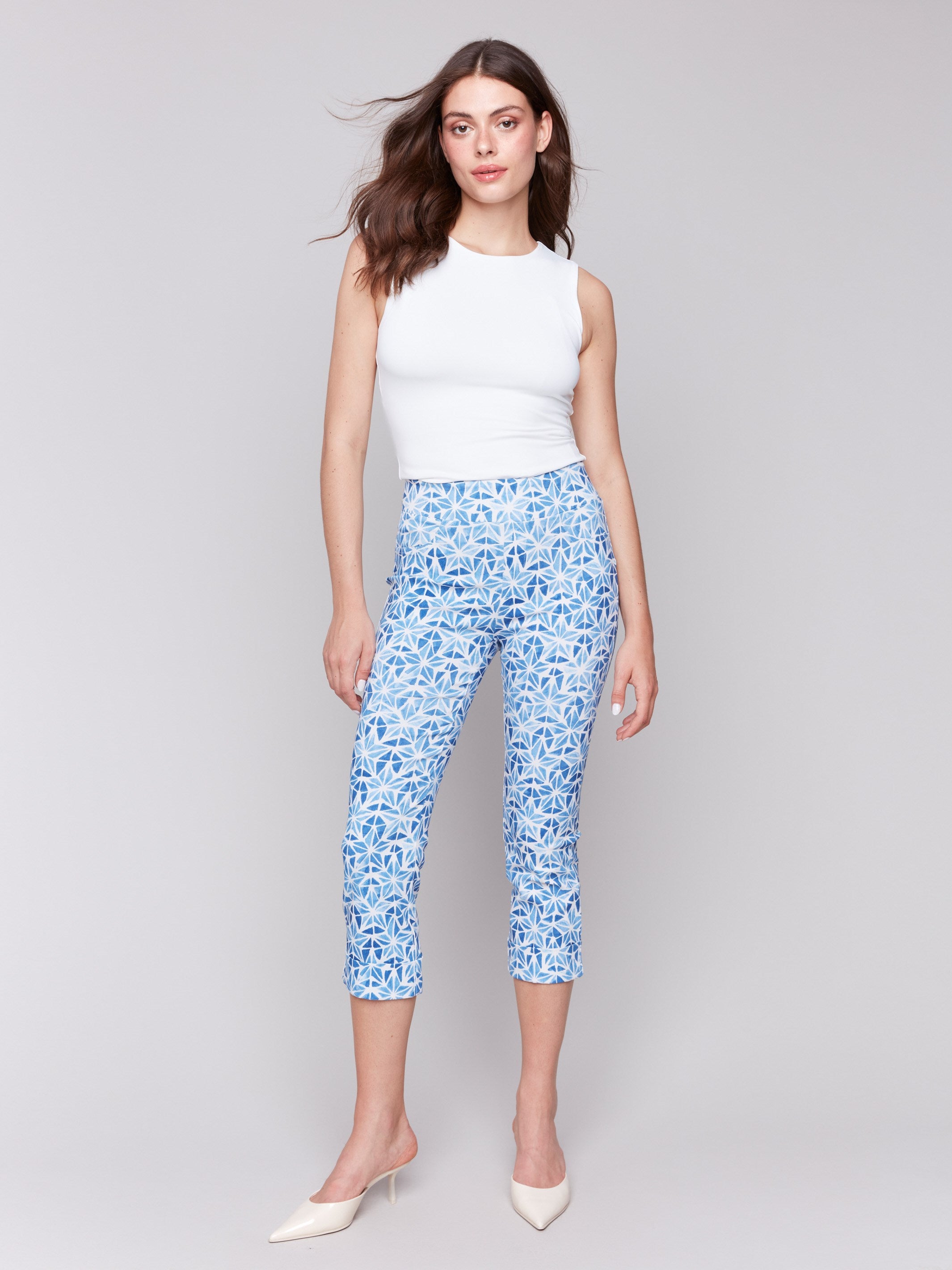 Blue star-patterned capri pants with a slim leg by Charlie B.