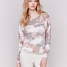 Women's Printed V-Neck Knit Top in soft tones, featuring long sleeves and a relaxed fit by Charlie B.