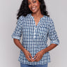 Blue blouse with relaxed fit and geometric pattern, featuring adjustable roll-up sleeves by Charlie B.