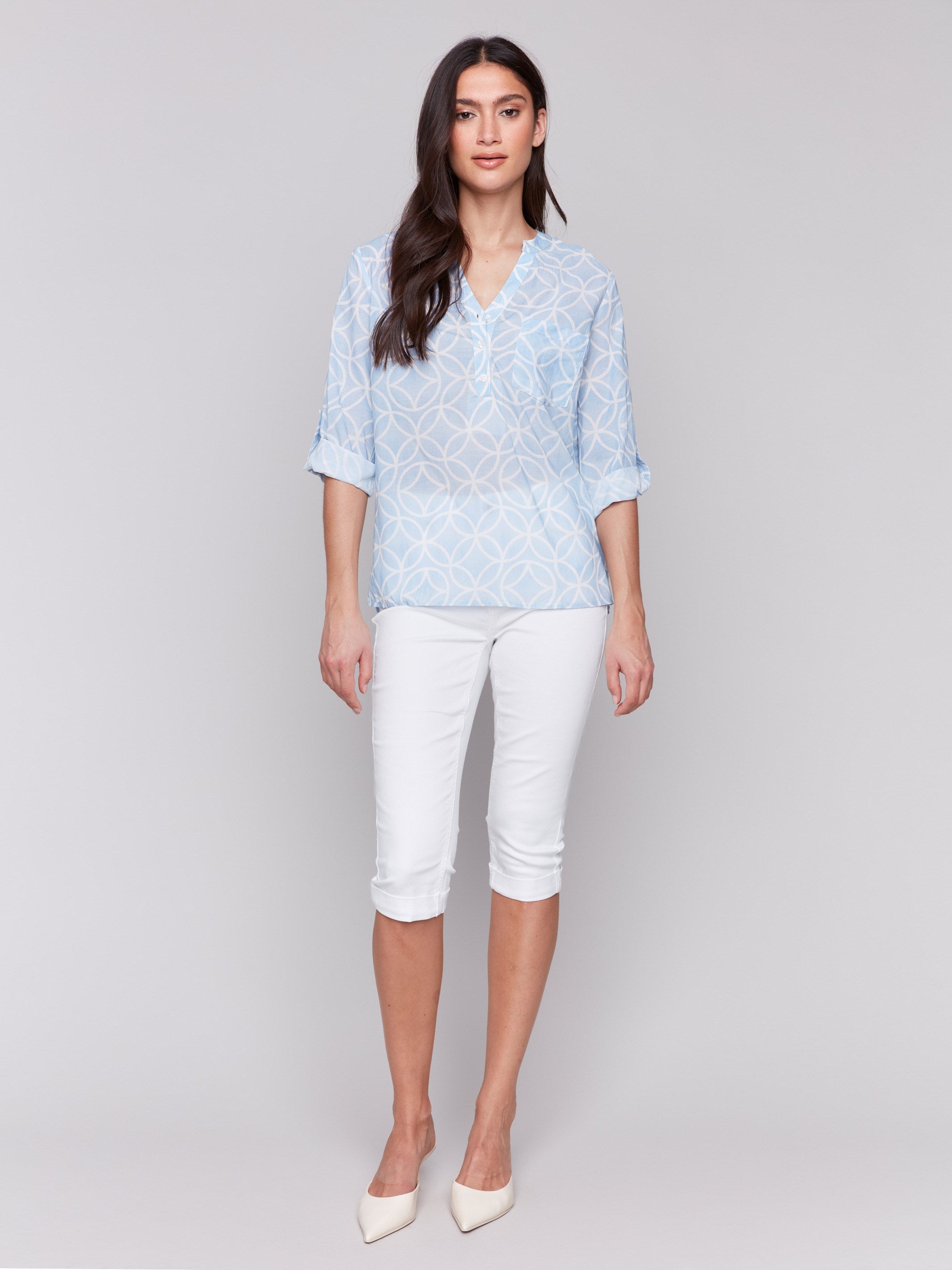 Blouse with adjustable roll-up sleeves in bluebell print by Charlie B.