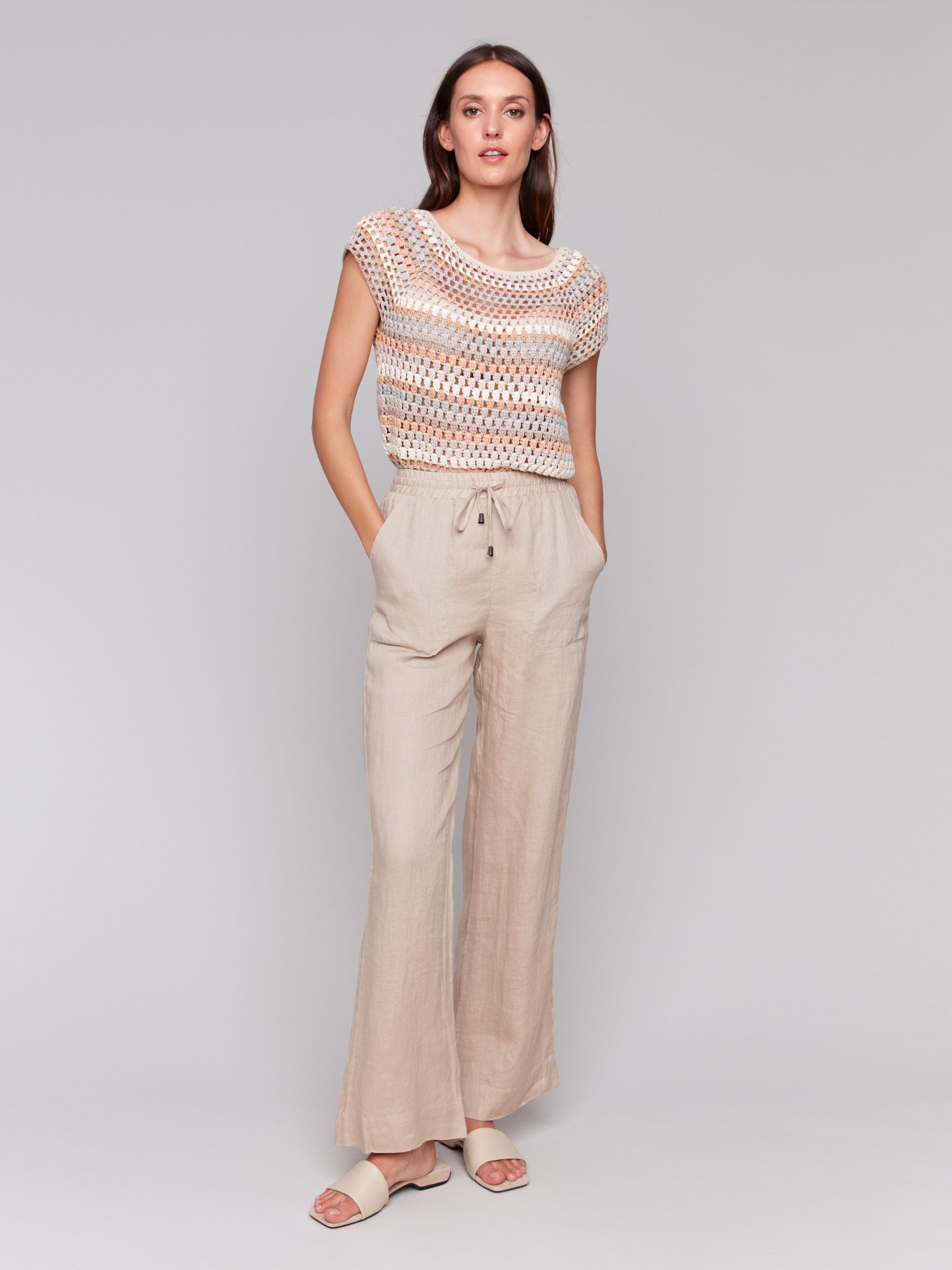 Biscuit-colored pants with a wide leg fit and regular rise by Charlie B.