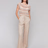 Biscuit-colored pants with a wide leg fit and regular rise by Charlie B.