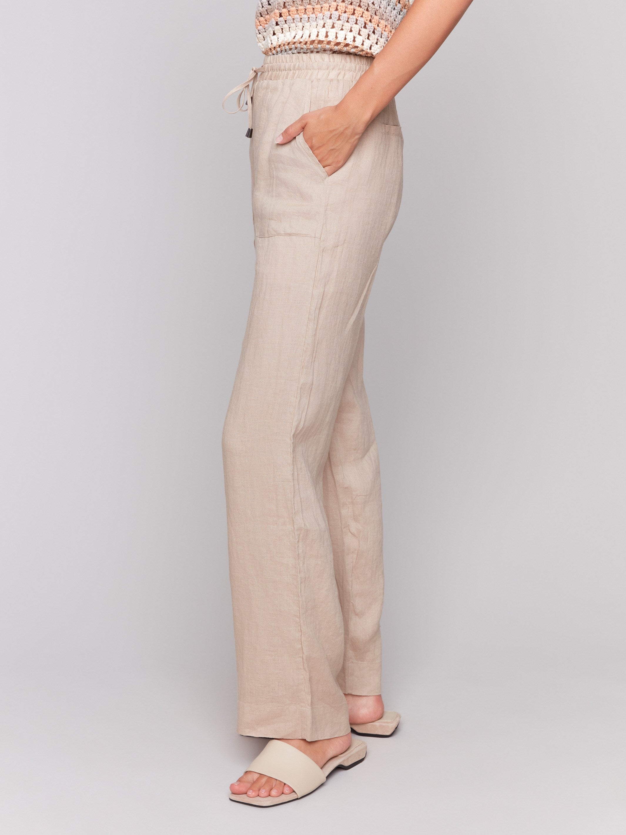 Stylish biscuit-colored pants with a front tie waistband by Charlie B.