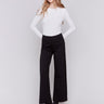 Black flared pants with pull-on style and elastic waistband by Charlie B.