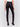 Black slim-leg pants with a regular rise, featuring a slit detail and an elastic waistband by Charlie B.