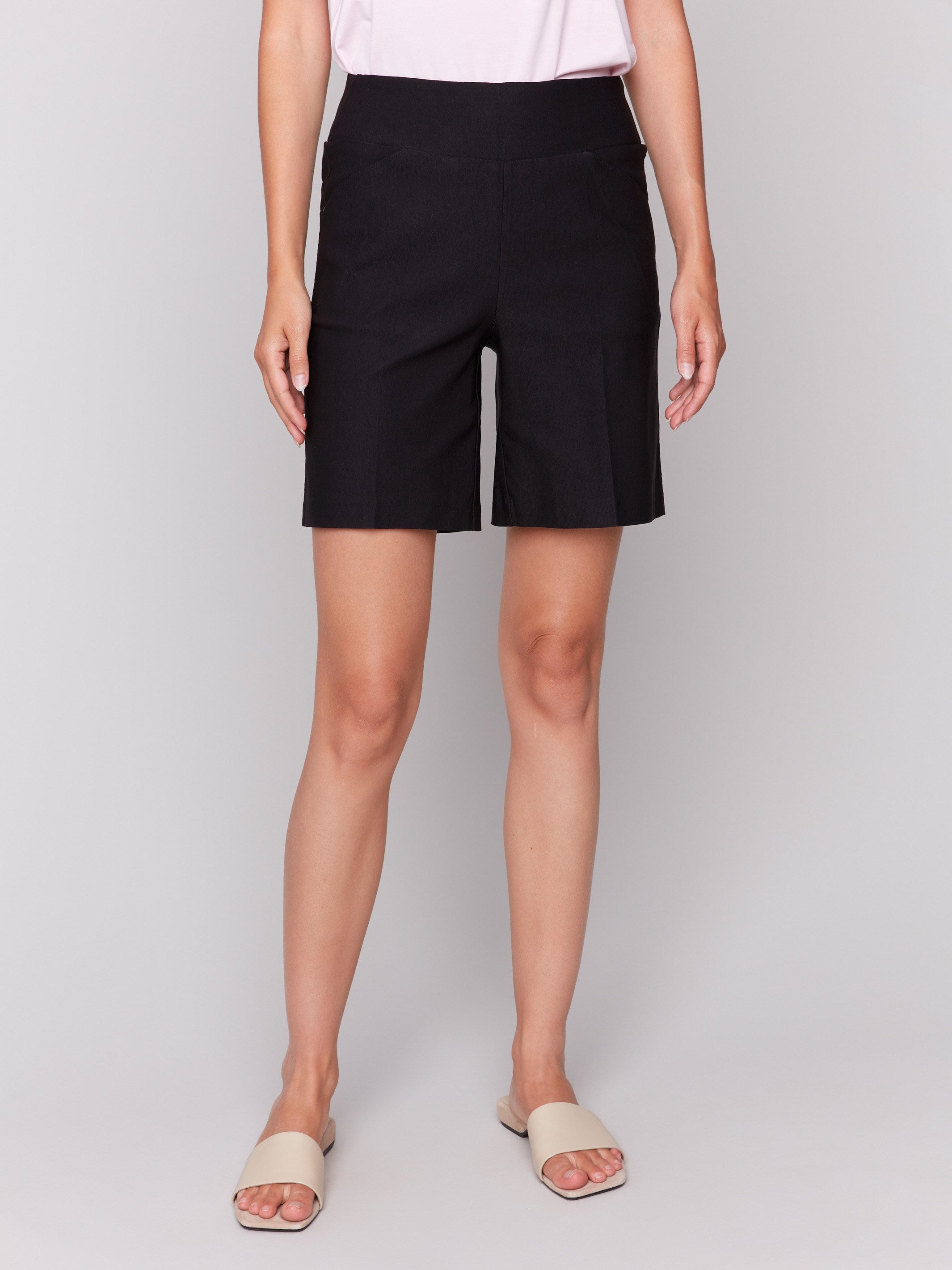 Sleek black shorts crafted from stretch fabric by Charlie B.