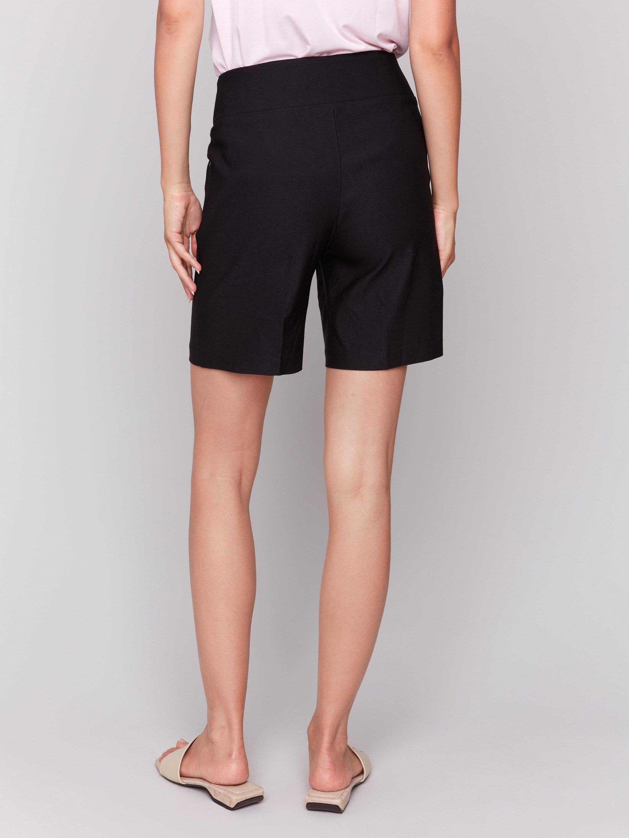 Elegant black shorts with two slash pockets by Charlie B.