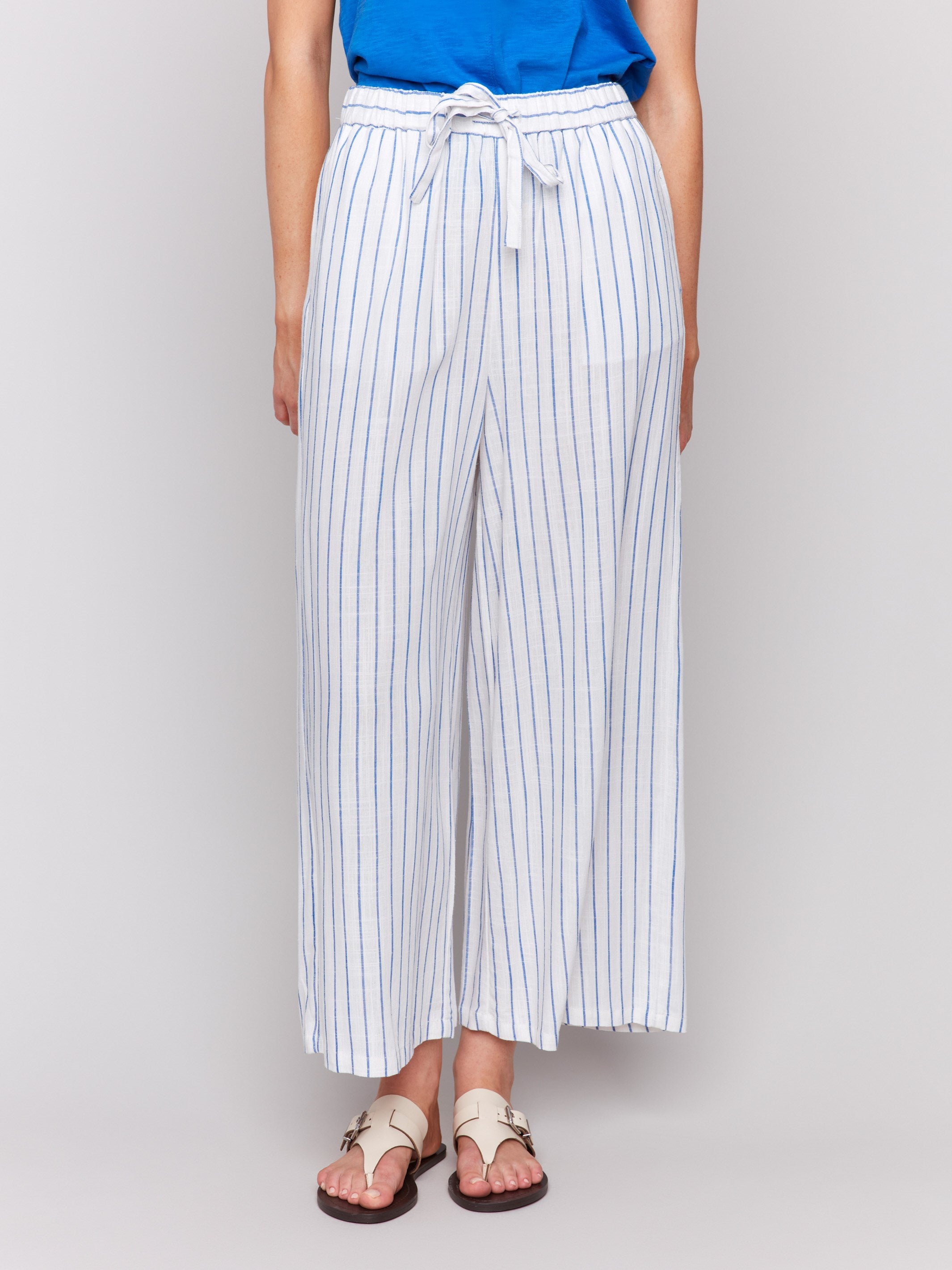 Striped pants featuring a cropped length design by Charlie B.