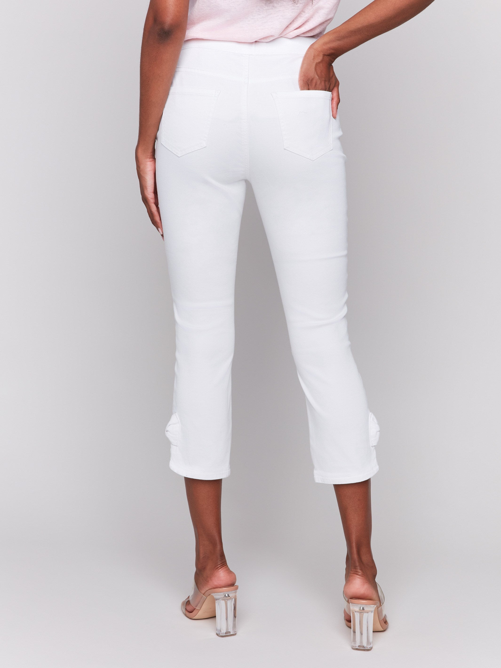 Elegant regular rise waist white pants with functional back pockets by Charlie B.