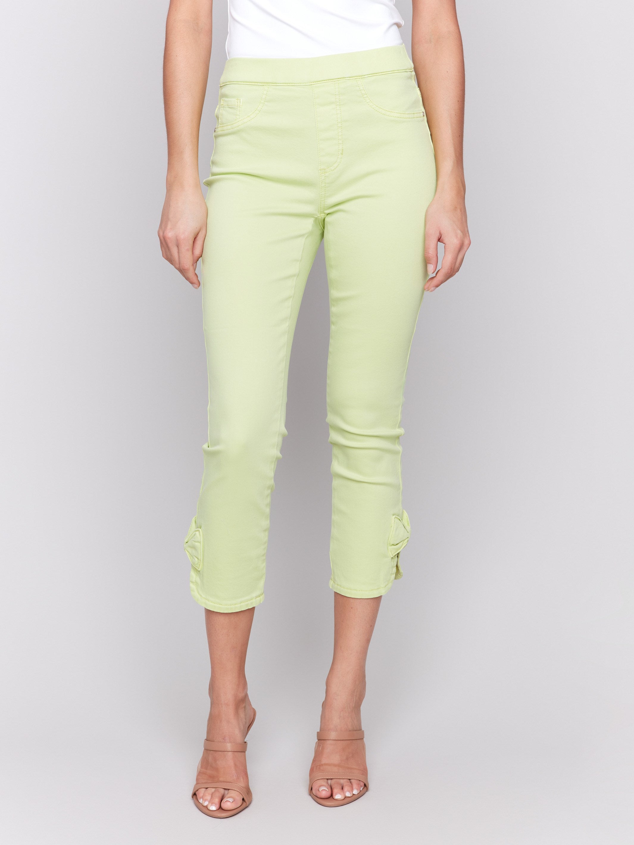 Stylish light green pants with two functional back pockets by Charlie B.