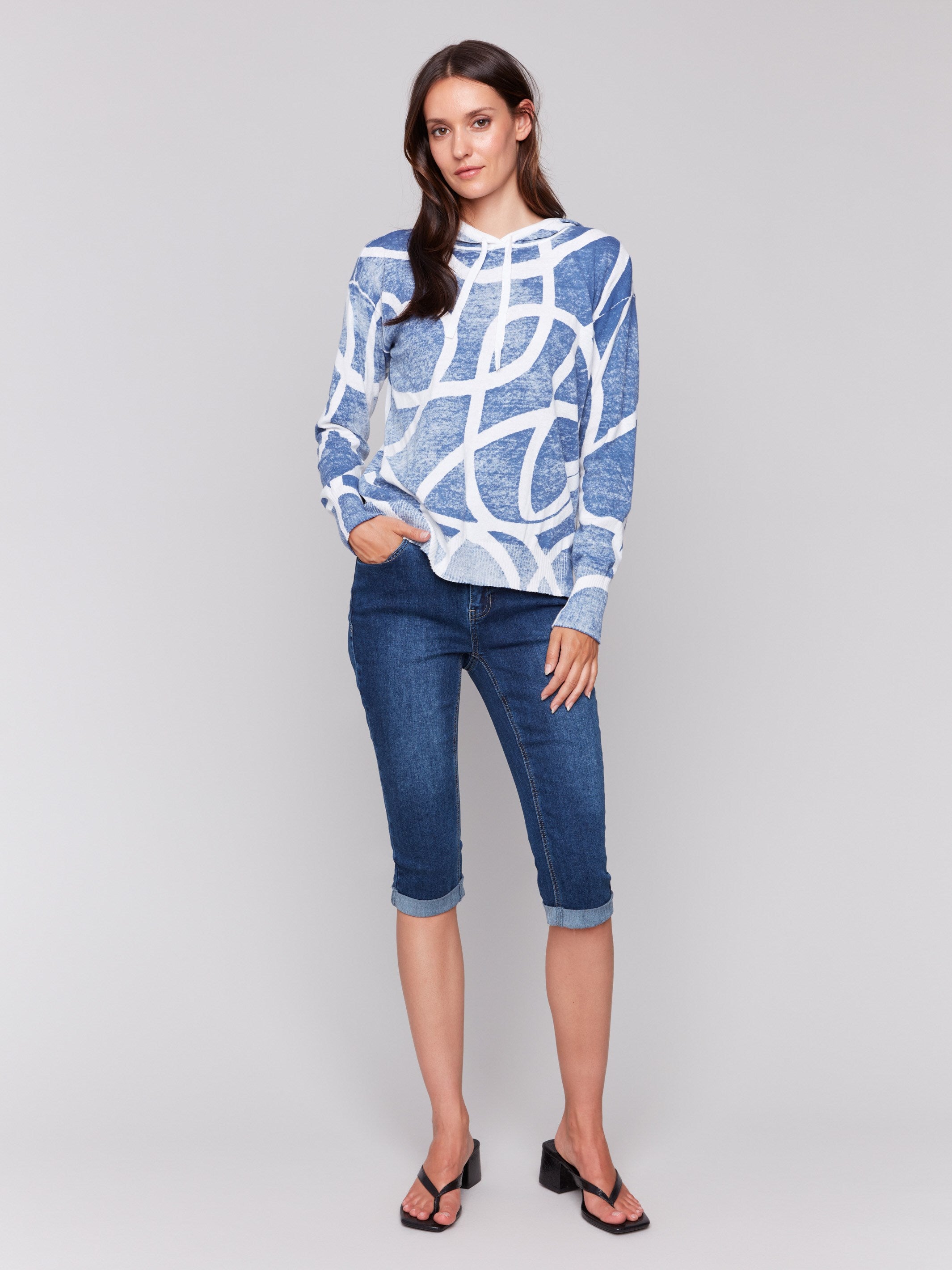 Denim-colored hoodie sweater featuring long sleeves by Charlie B.