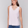 Light pink reversible camisole with scoop neck and V-neck details, crafted in soft bamboo viscose by Charlie B.